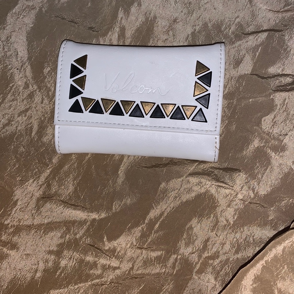 Vintage Volcom wallet.Rare find,Pre-loved, excellent condition,but some chafing